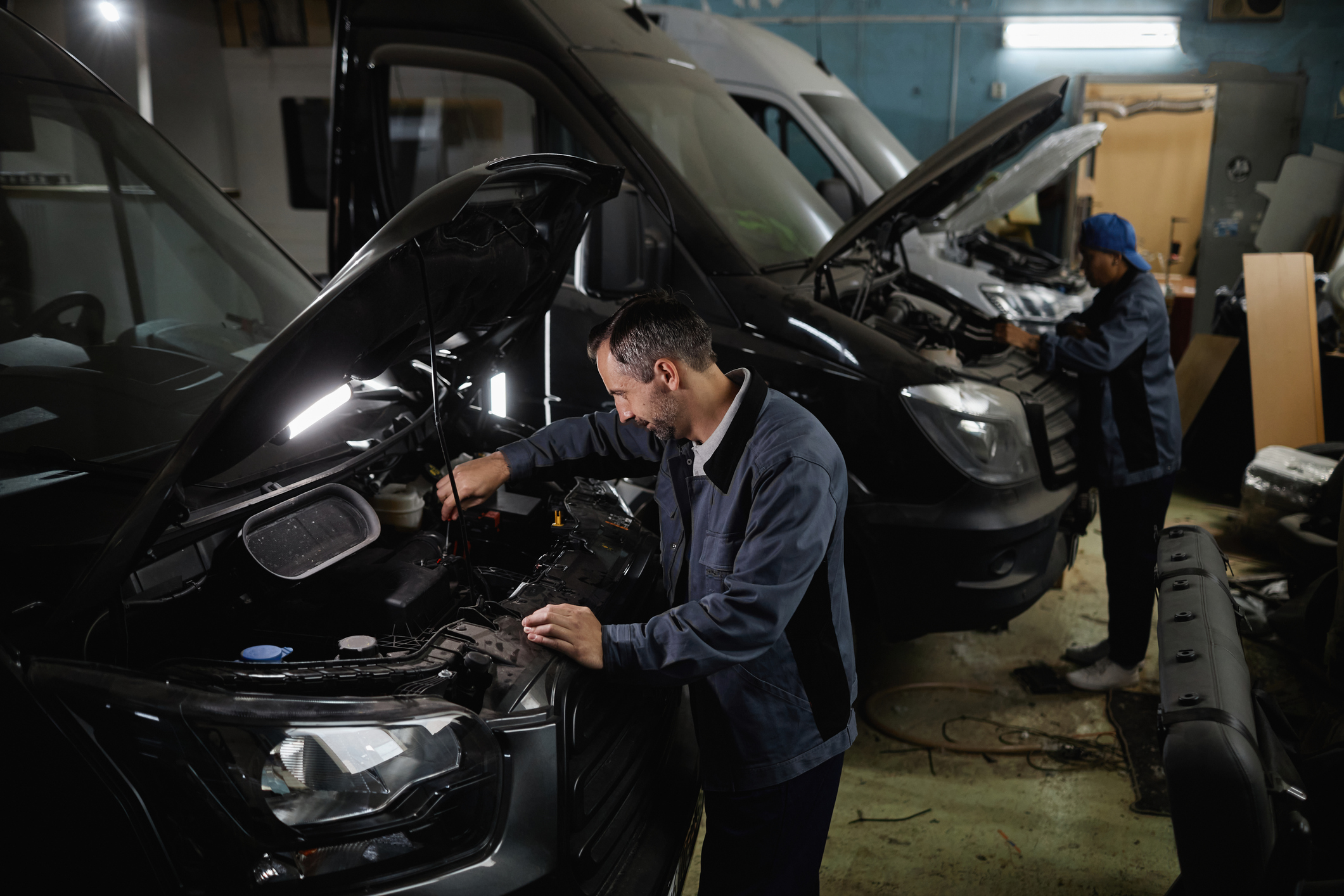 Mechanics In Car Garage